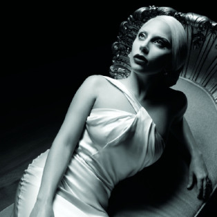 lady gaga laying on a chair, american horror story