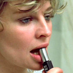 julie christie, lipstick in mouth