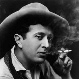 ee cummings, poet, man smoking cigarette