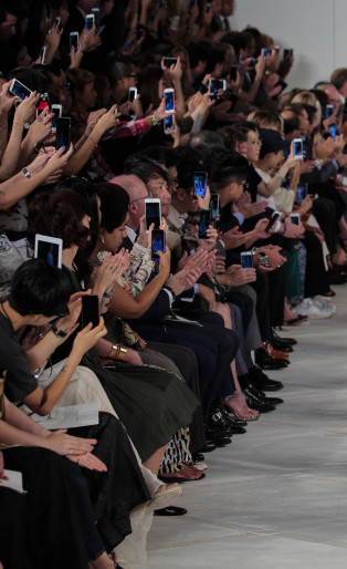 runway, girl walking down runway, printed dress, fashion show