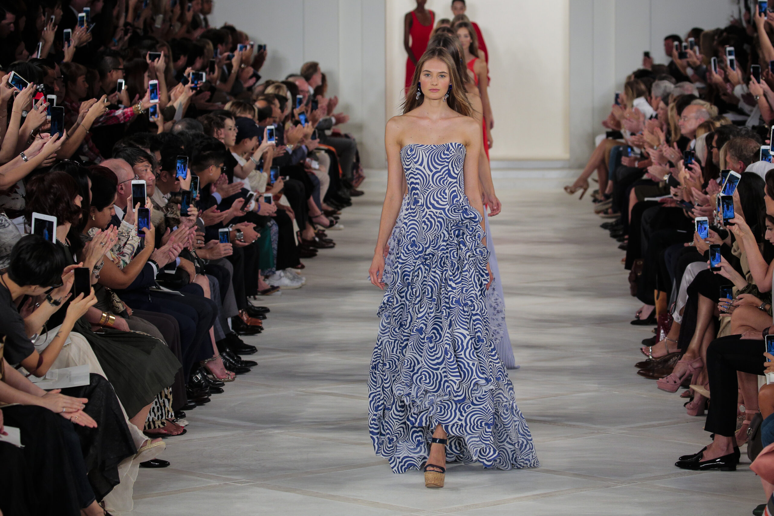 runway, girl walking down runway, printed dress, fashion show