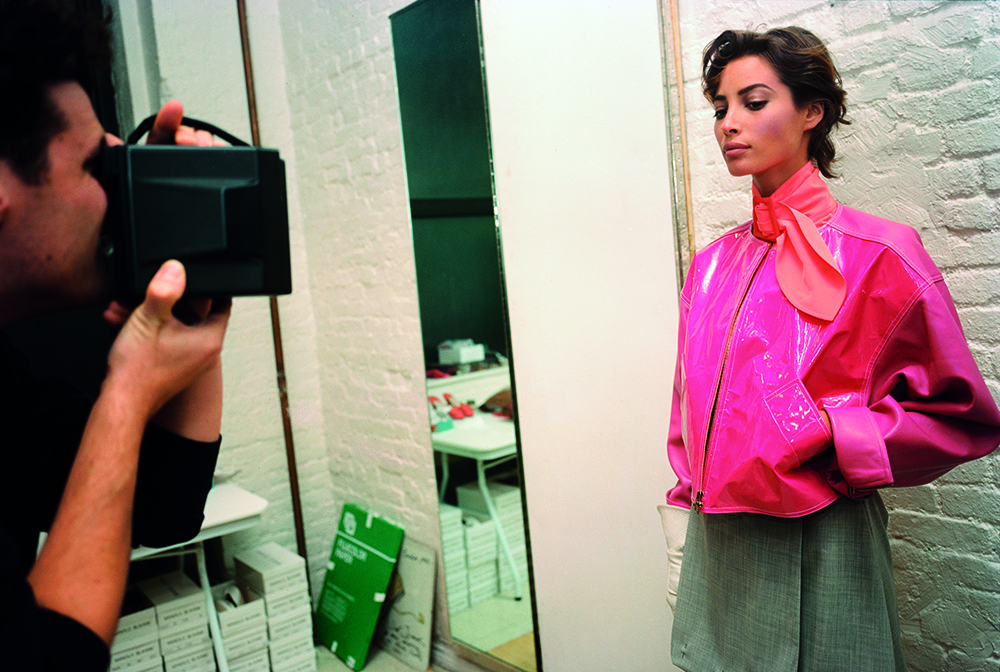 isaac mizrahi fashion, model backstage with pink jacket