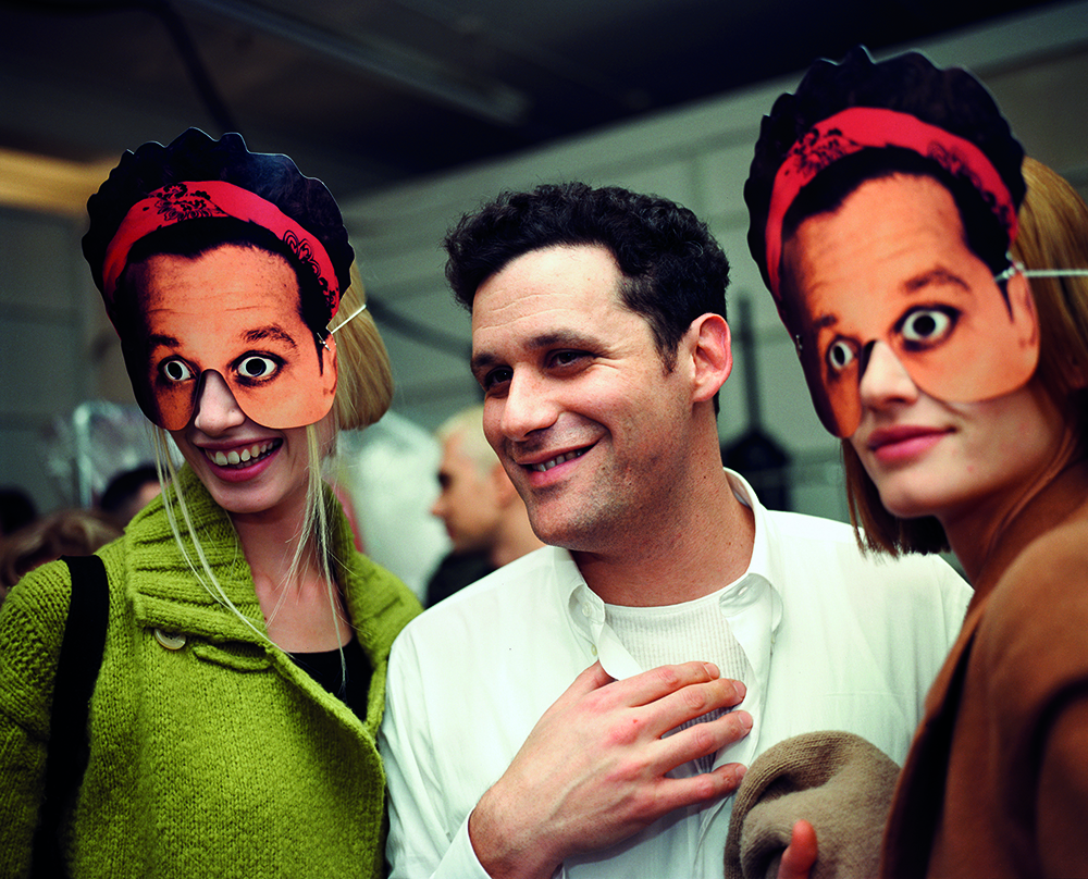 isaac mizrahi fashion, backstage with models wearing masks