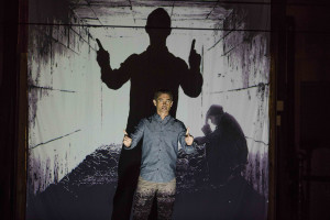 the path, man standing and pointing in front of a projector