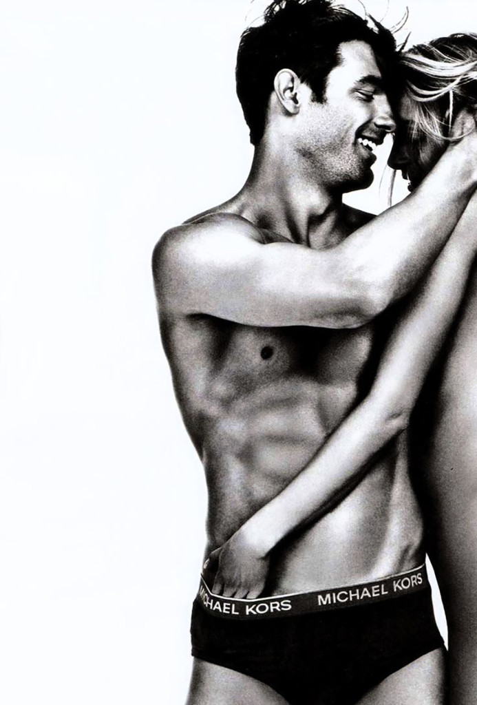 michael kors underwear ad, woman with hand in mans underwear