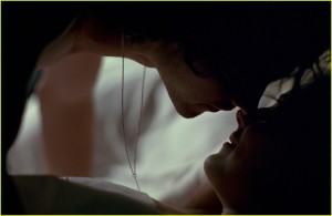 man and woman kissing in a bed, burberry