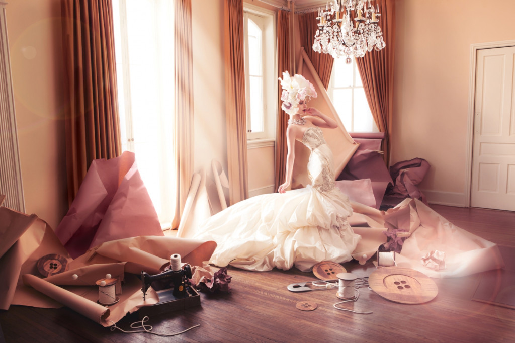 cade martin photography, model surrounded by sewing materials