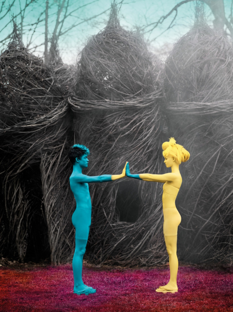 cade martin photography, blue and yellow models with painted bodies touching hands