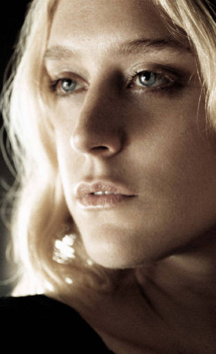 portrait of chloe sevigny looking over her shoulder