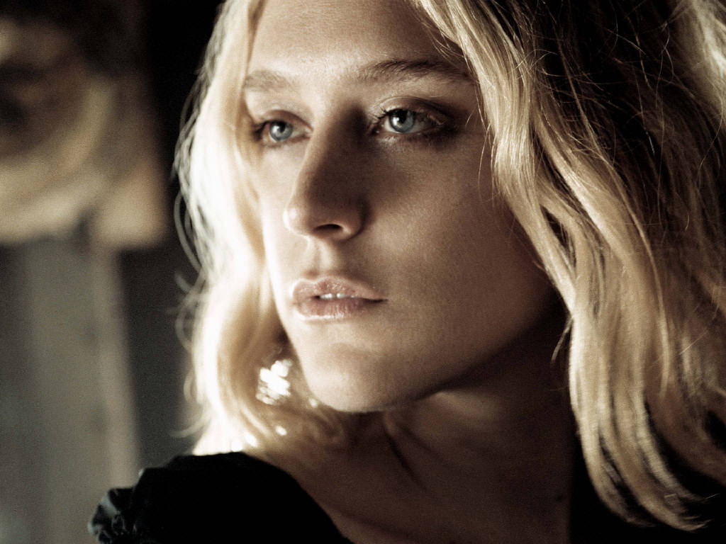 portrait of chloe sevigny looking over her shoulder