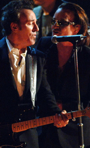 Bruce Springsteen, presenter, with Bono of U2, inductee (Photo by Jeff Kravitz/FilmMagic)