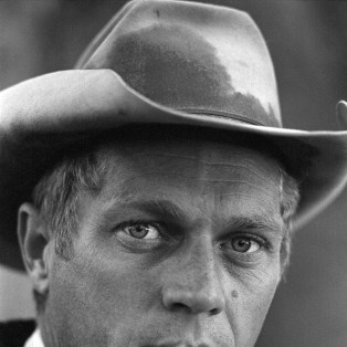 Close-up of American actor Steve McQueen (1930 - 1980) as he smokes a cigarette while on a camping trip in the Sierra Madre Mountains, California, May 1963. (Photo by John Dominis/The LIFE Picture Collection/Getty Images)
