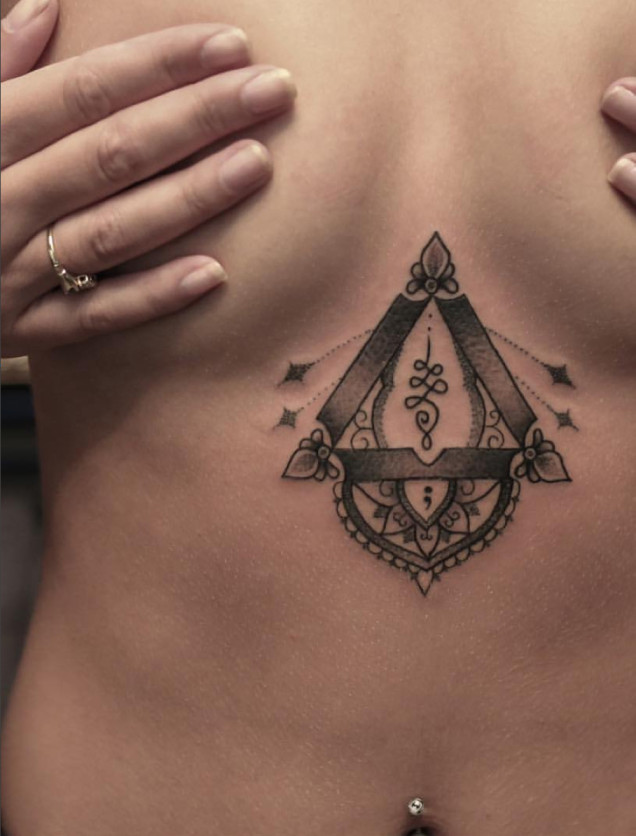 bang bang, chest tattoo on women's sternum