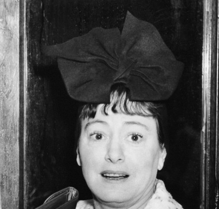 dorothy parker black and white portrait of her with a big bow on her head