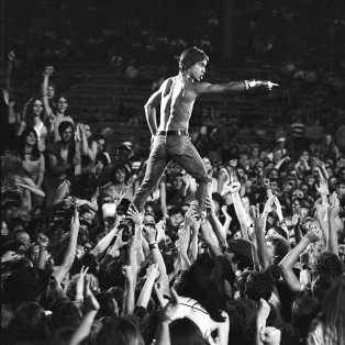 iggy pop and the stooges performing for a large audience