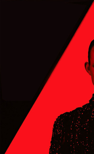 neon demon movie, elle fanning in red triangle and red light wearing a black dress