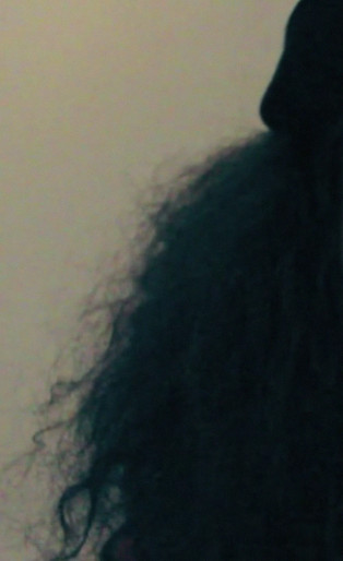 warsan shire portrait, lemonade poet, woman with nose ring and beanie