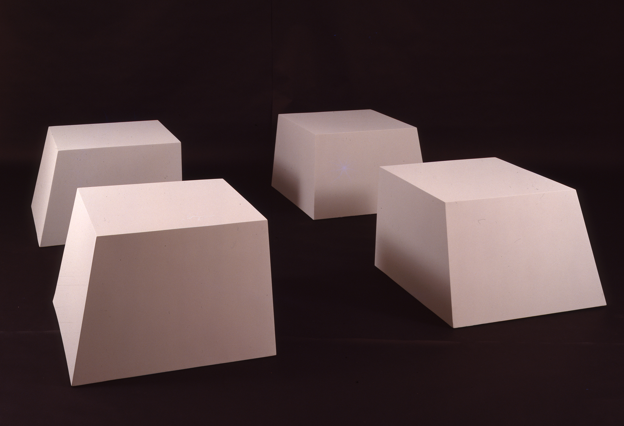 Untitled (Battered Cubes) (1966), Robert Morris. Painted fiberglass; 4 units, each unit: 24 x 36 x 36 inches; installed: 108 x 108 inches. Collection of Virginia Dwan. © 2016 Robert Morris/Artists Rights Society (ARS), New York.
