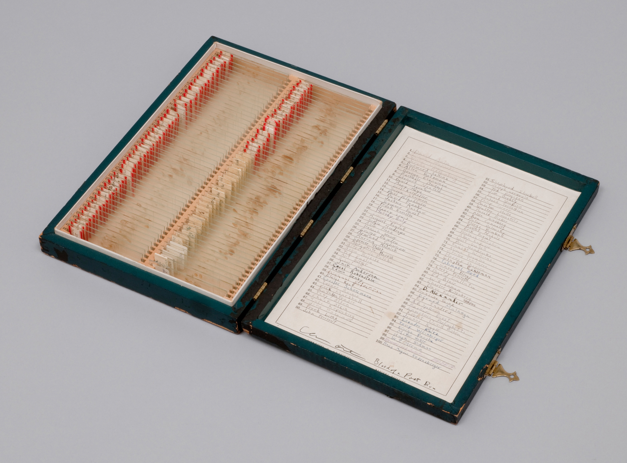 Blood of a Poet Box, 1965–68), by Eleanor Antin. Wood box containing 94 glass slides of blood specimens and specimen list, 11.5 x 7.75 x 1.5 inches. Lent by the American Fund for the Tate Gallery 2009. © Tate, London 2016.