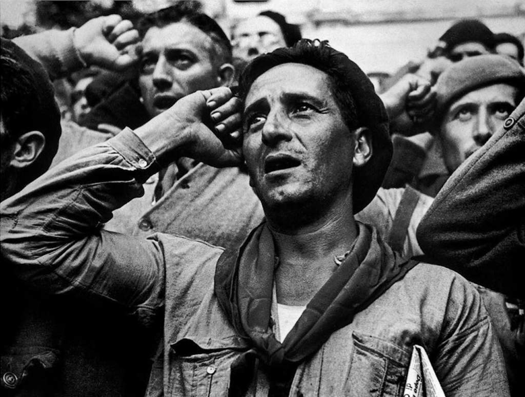 Robert Capa's Farewell ceremony for the International Brigades. Near Barcelona, Spain. October 25, 1938