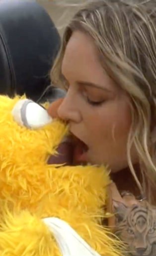Tove Lo kissing muppet in car