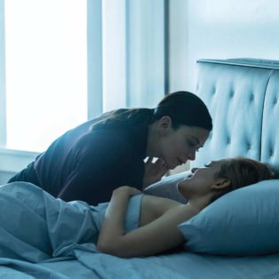 Photograph of Anna’s character Erica Myles in The Girlfriend Experience Season 2 in bed with escort Anna Garner.