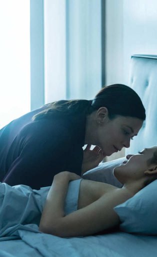 Photograph of Anna’s character Erica Myles in The Girlfriend Experience Season 2 in bed with escort Anna Garner.