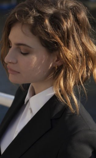 Christine Aguilera white shirt black jacket