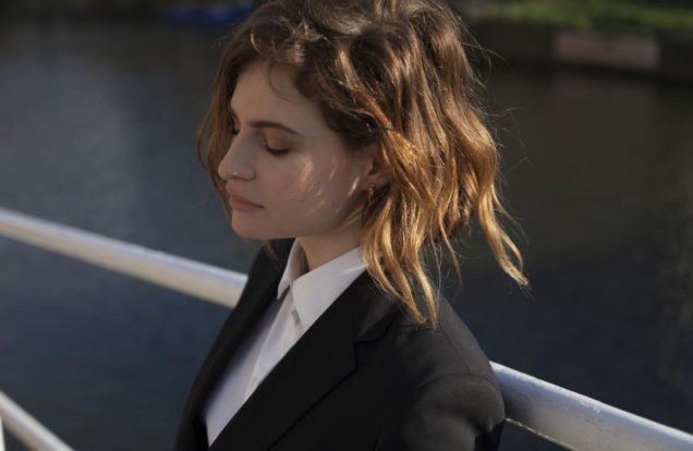 Christine Aguilera white shirt black jacket