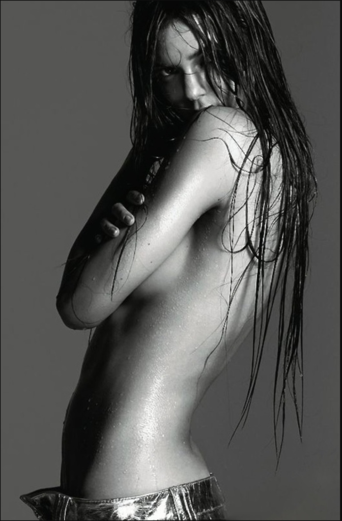 Sexy photograph of Kendall Jenner with wet hair and naked side view