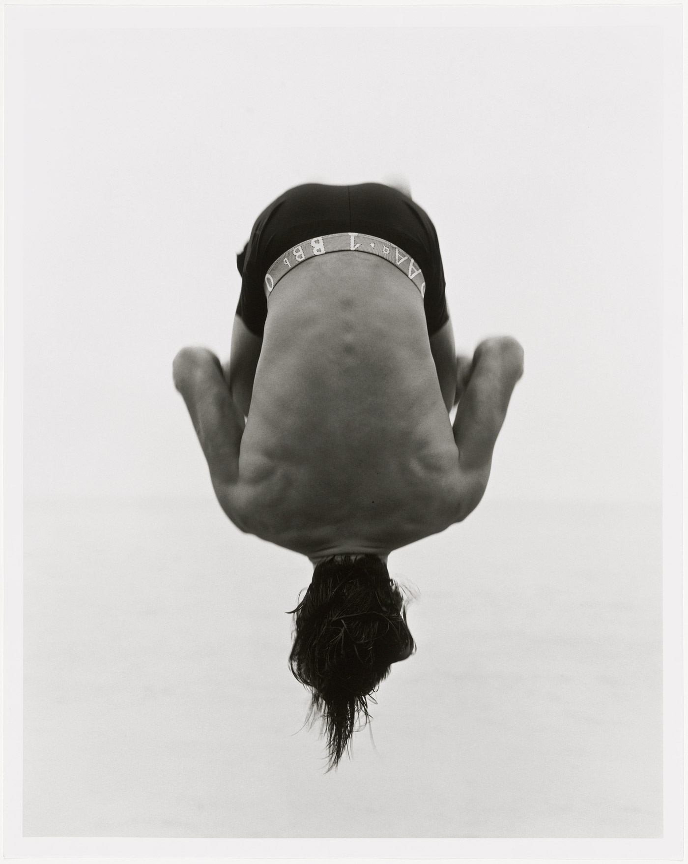 Backflip, Paradise Cove, by Herb Ritts