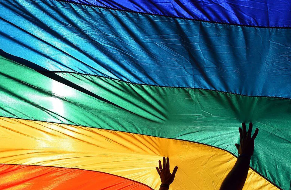 rainbow flag with hands