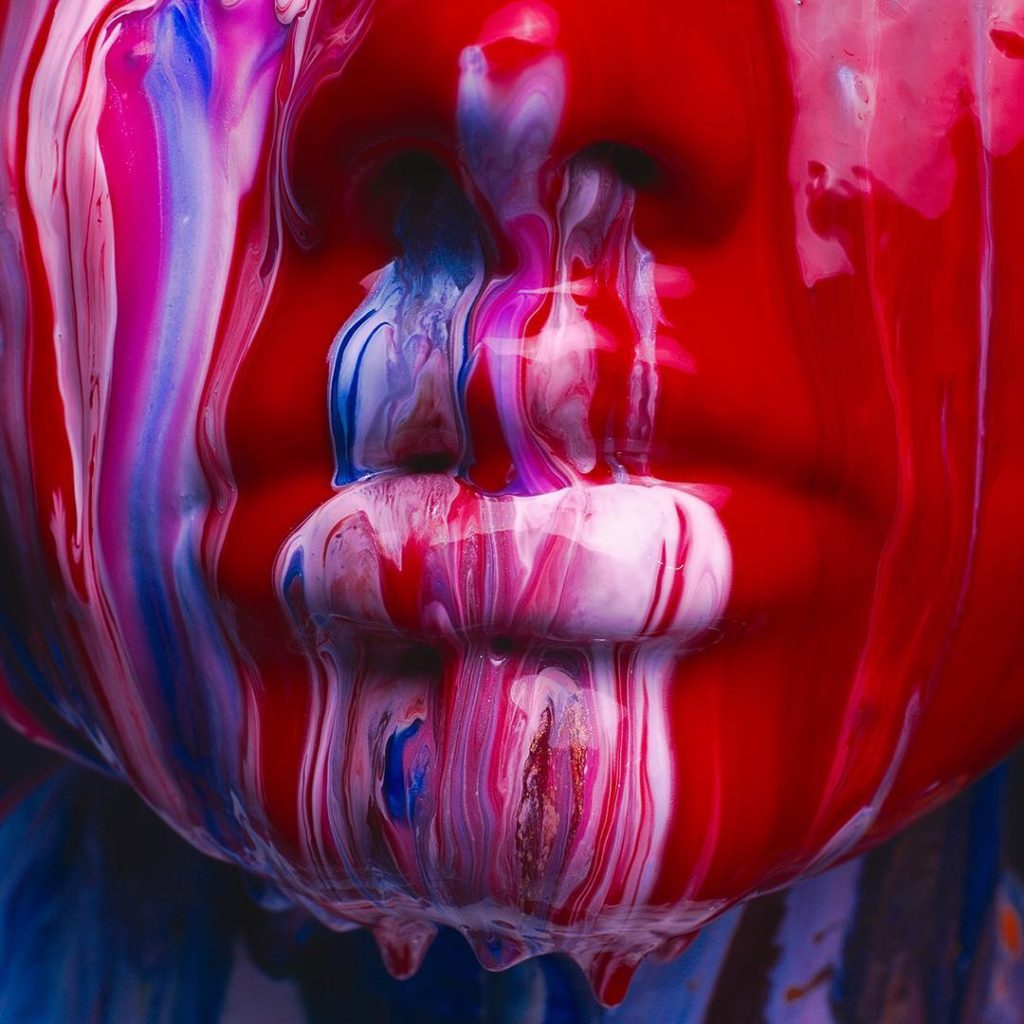 Photographer Tyler Shields Photograph of a Women's Face Dripping Paint