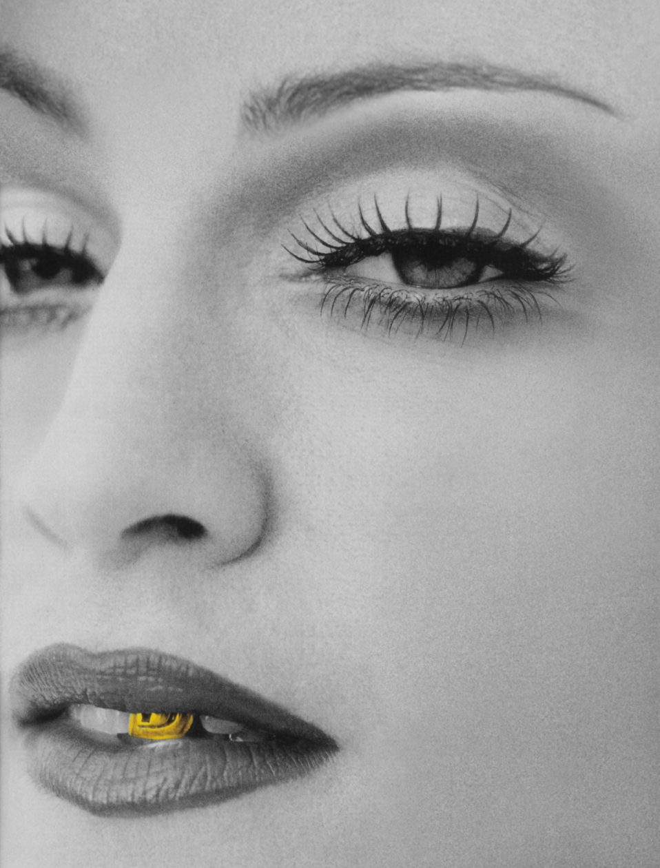 Black and White portrait of madonna with gold front tooth tooth