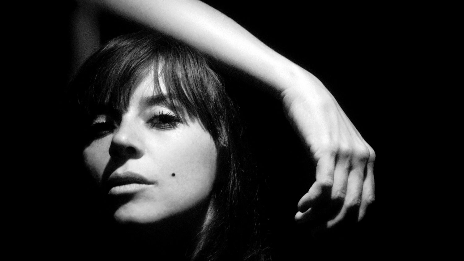 Cat Power arm over head black and white