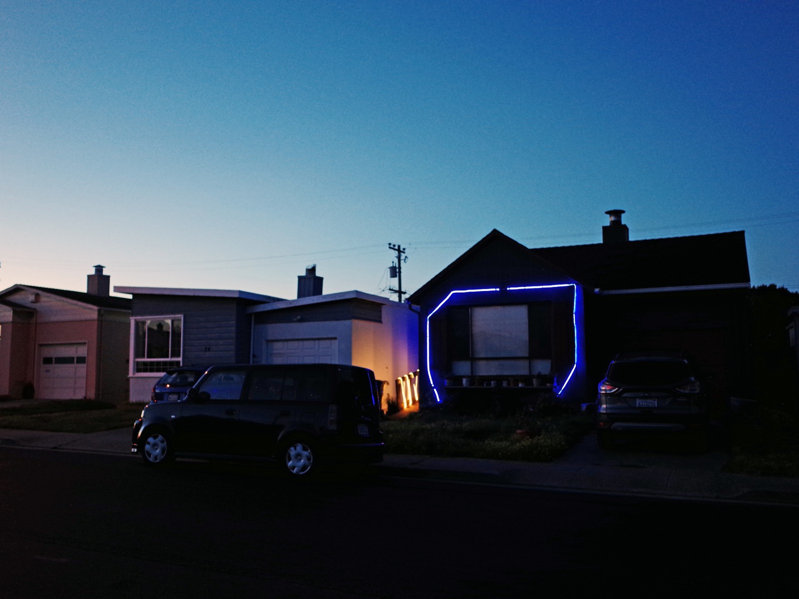 Todd Hido house with neon light frame