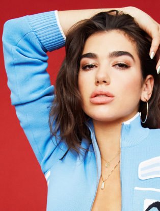 dua lipa blue open front sweater hand on head