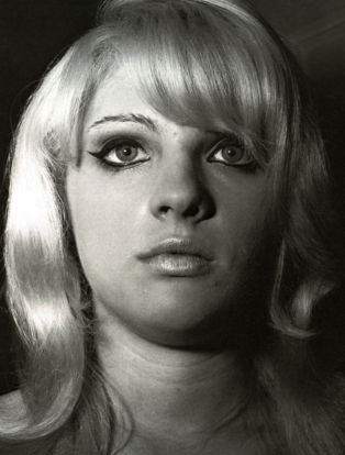 photograph of a blonde woman taken by Diane Arbus