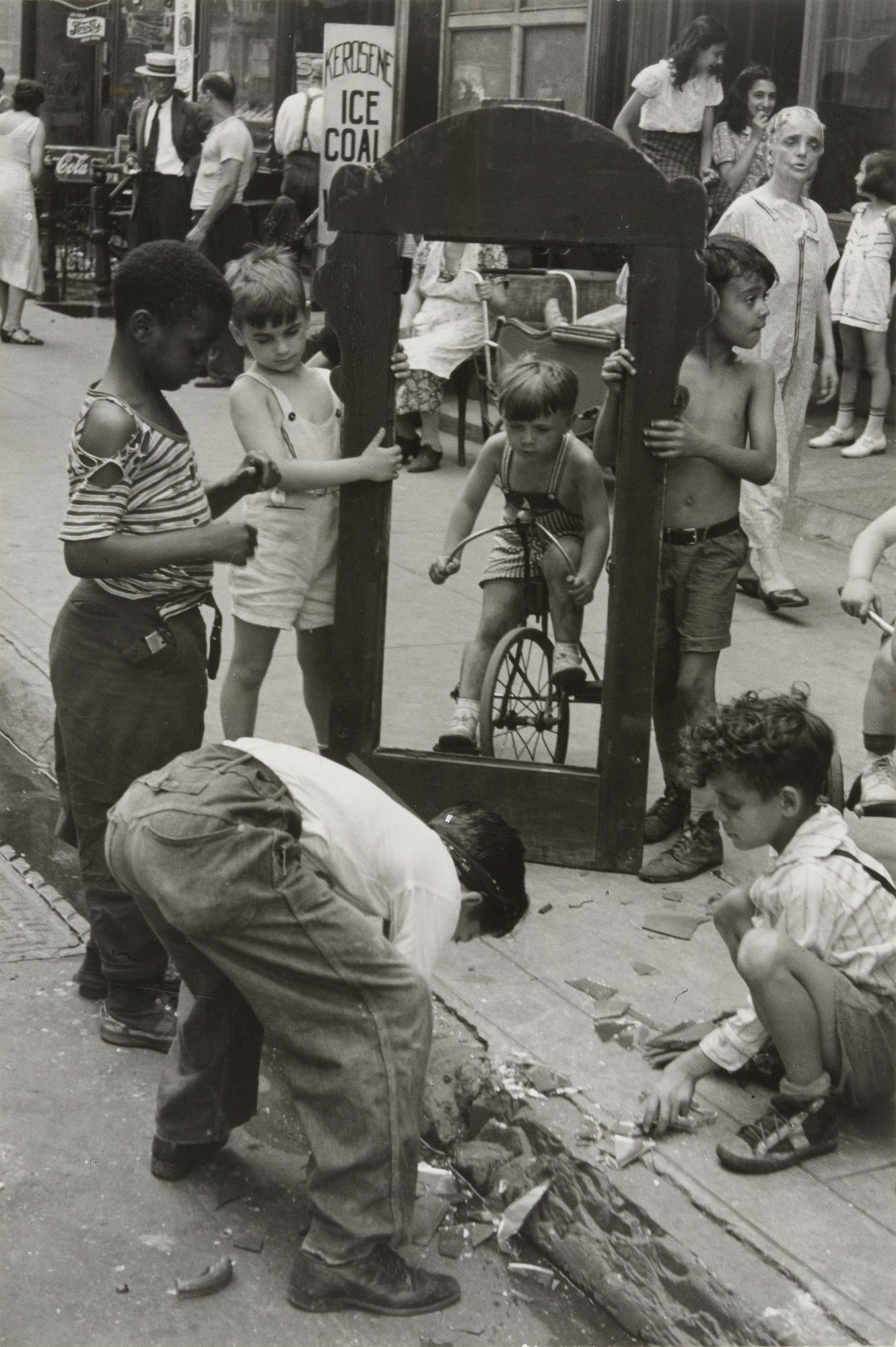 Boys play on sidewalk in New York by Helen Levitt