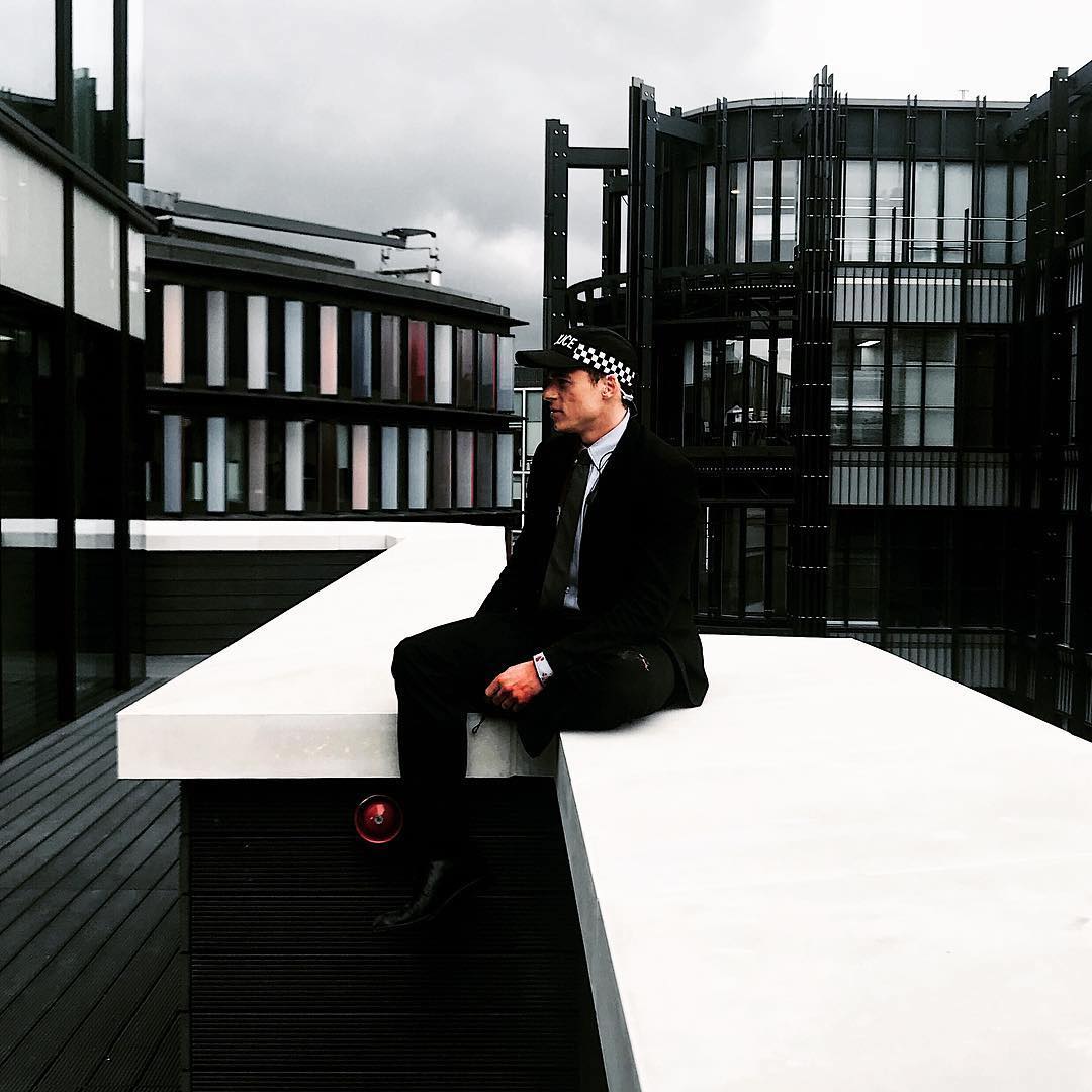 Richard Madden on rooftop