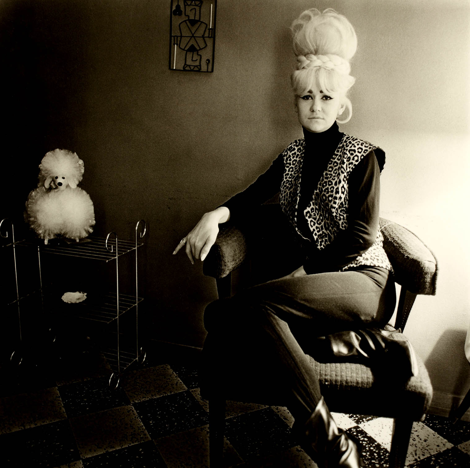 Diane Arbus photograph of a woman with a toy dog