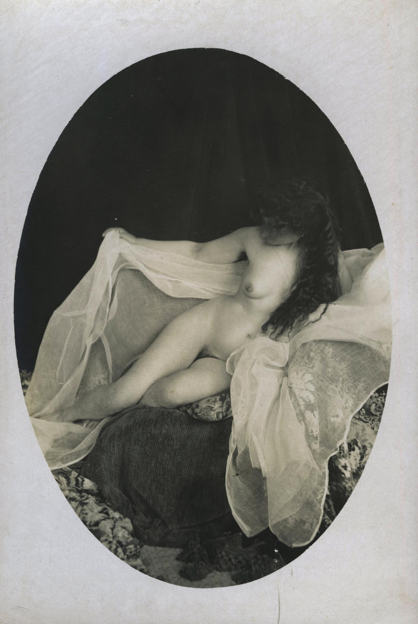 vintage photo of a woman at a brothel