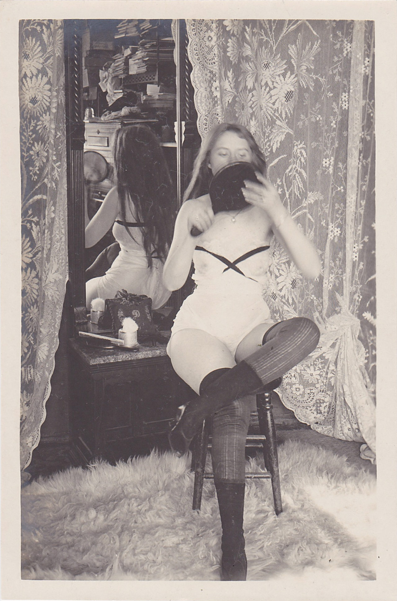 vintage photo of a woman at a brothel