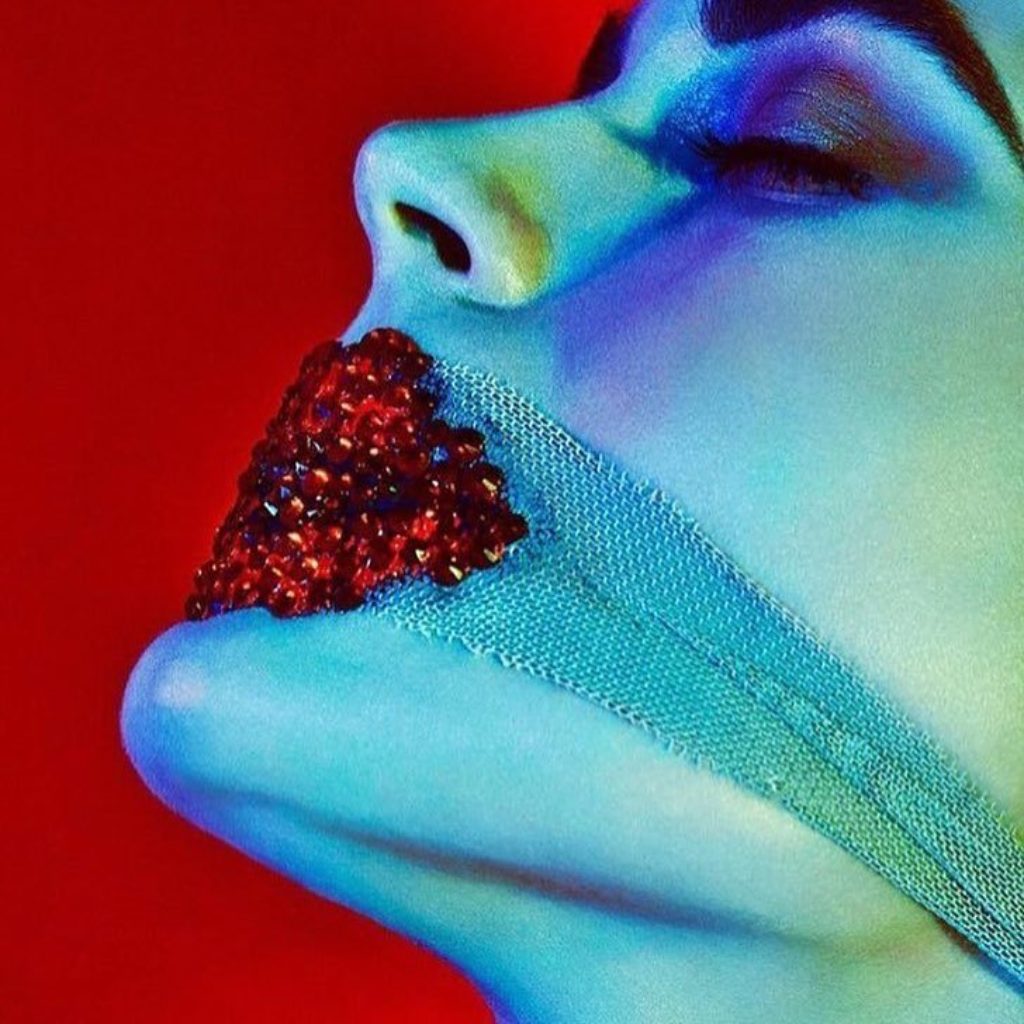 Pat McGrath jeweled red lips inspired by writer Charles Baudelaire