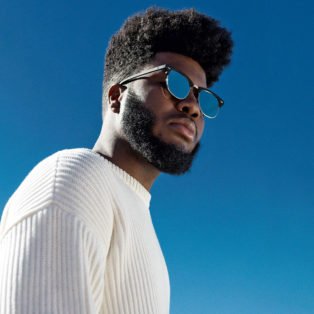 Khalid blue sky sunglasses white sweater