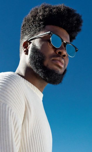 Khalid blue sky sunglasses white sweater