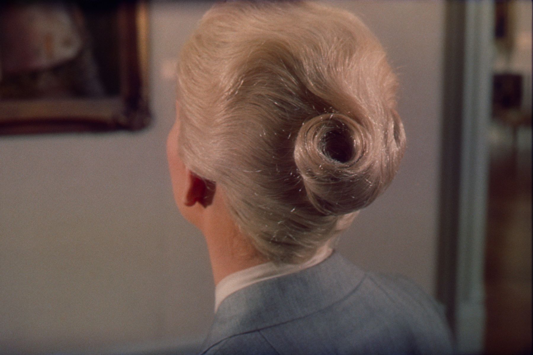 blonde woman with coiled hair, Vertigo, 1958