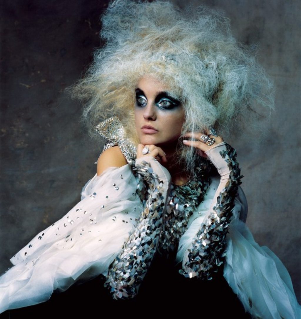 Karl Lagerfeld Couture-Model Wearing Wild Blue and White Big Hair Do and Heavy Black and Blue Eye Make Up