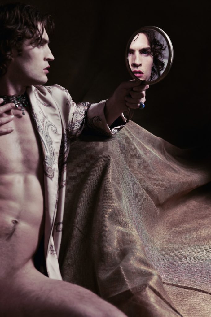 Karl Lagerfeld Photo of a Beautiful Male Holding a Hand Mirror and Wearing only a Silk robe