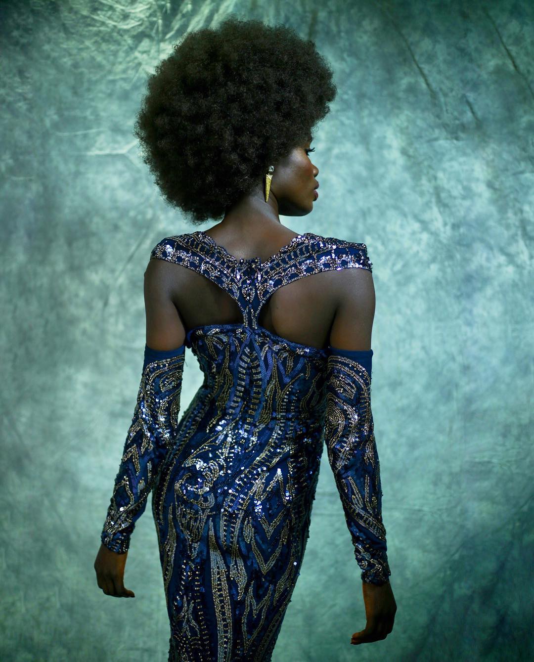 Marc Bouwer Navy and Silver Beaded Gown Worn by an African American Model with an Afro-Back View